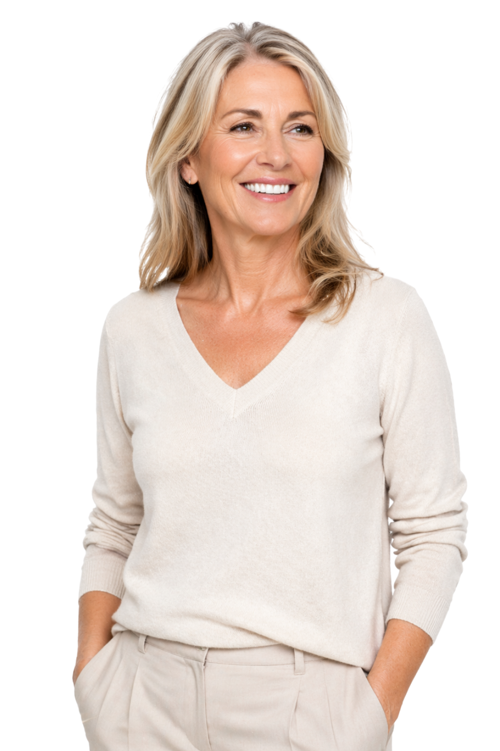 Confident middle-aged woman smiling after dental implant treatment